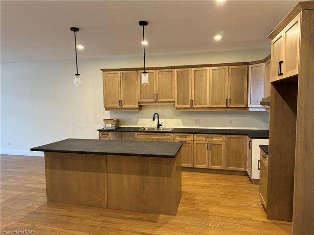 Laundry closet located in 2pc bathroom *Photo not of actual unit | Image 15