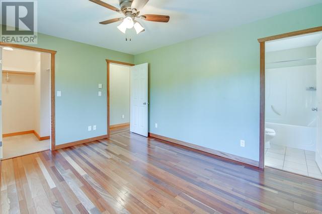 primary bedroom with walk in closet | Image 19