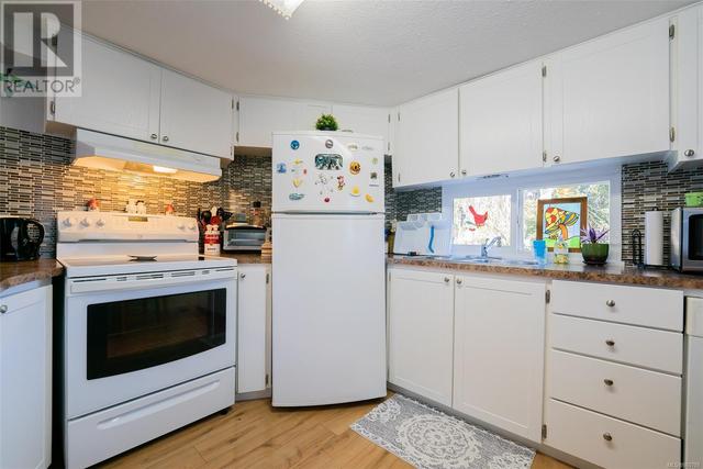 2 - 1074 Old Victoria Rd, House other with 2 bedrooms, 1 bathrooms and 1 parking in Nanaimo BC | Image 35