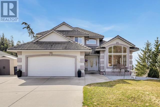 416 Woodpark Court, House detached with 5 bedrooms, 4 bathrooms and 2 parking in Kelowna BC | Image 1