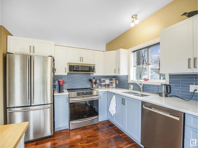 7775 96 St Nw, House attached with 2 bedrooms, 2 bathrooms and 2 parking in Edmonton AB | Image 17