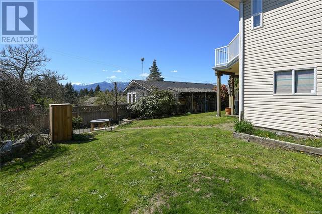 1899 10th St E, House detached with 4 bedrooms, 3 bathrooms and 6 parking in Courtenay BC | Image 39