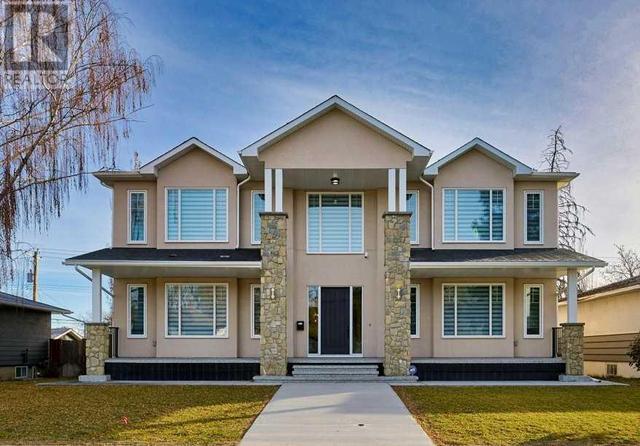 54 Malibou Road Sw, House detached with 5 bedrooms, 3 bathrooms and 3 parking in Calgary AB | Image 1