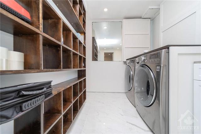 Inviting laundry room. | Image 26