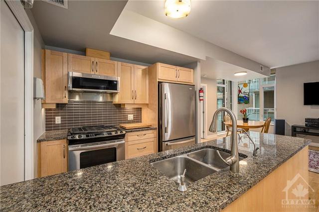 Lots of cabinetry, walk in pantry, double sinks and stainless steel appliances | Image 11