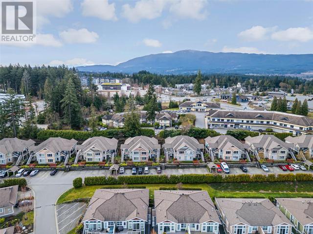 101 - 6157 Washington Way, House attached with 2 bedrooms, 2 bathrooms and 2 parking in Nanaimo BC | Image 49