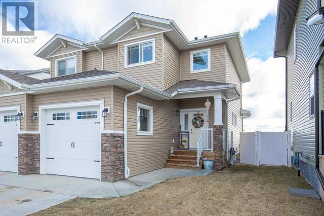 51 Iron Gate Boulevard, House semidetached with 3 bedrooms, 2 bathrooms and 2 parking in Sylvan Lake AB | Image 2