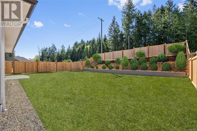 3289 Klanawa Cres, House detached with 4 bedrooms, 3 bathrooms and 4 parking in Courtenay BC | Image 45