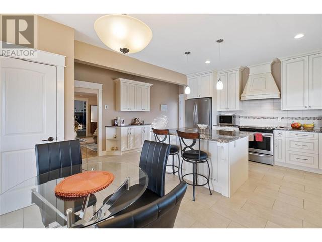 1297 Tanemura Crescent, House detached with 4 bedrooms, 4 bathrooms and 3 parking in Kelowna BC | Image 36