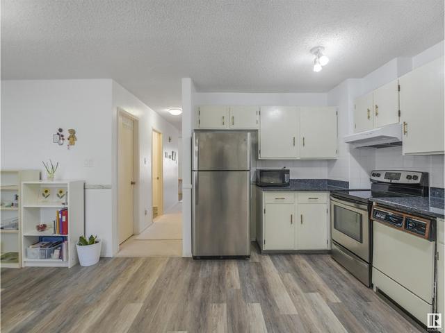 1052 106 St Nw, House attached with 3 bedrooms, 1 bathrooms and 2 parking in Edmonton AB | Image 12