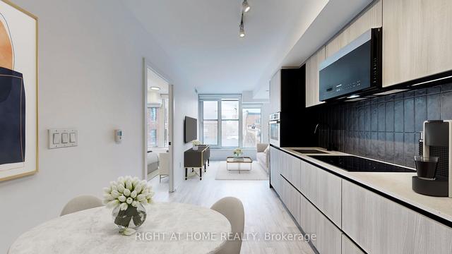 410 - 2 Augusta Ave, Condo with 1 bedrooms, 2 bathrooms and 0 parking in Toronto ON | Image 12