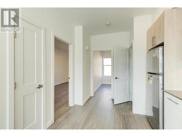 61 - 685 Boynton Place, House attached with 2 bedrooms, 1 bathrooms and 1 parking in Kelowna BC | Image 24