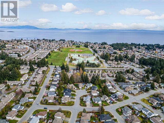 101 - 6157 Washington Way, House attached with 2 bedrooms, 2 bathrooms and 2 parking in Nanaimo BC | Image 54