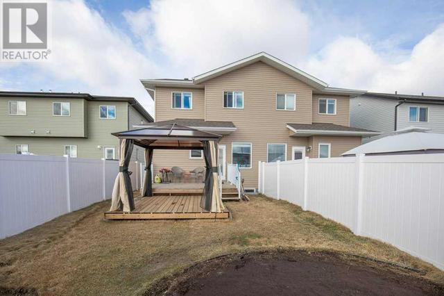 51 Iron Gate Boulevard, House semidetached with 3 bedrooms, 2 bathrooms and 2 parking in Sylvan Lake AB | Image 4