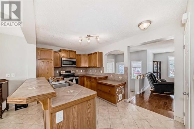 163 Eversyde Circle Sw, House detached with 4 bedrooms, 2 bathrooms and 2 parking in Calgary AB | Image 8