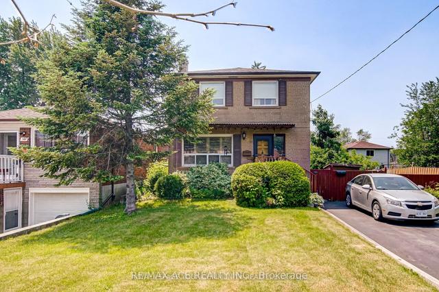 100 Granger Ave, House detached with 4 bedrooms, 2 bathrooms and 5 parking in Toronto ON | Image 1