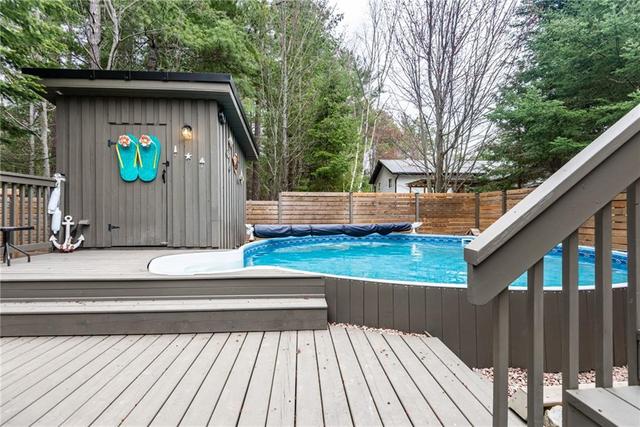 On-ground pool with deck and pool house | Image 28