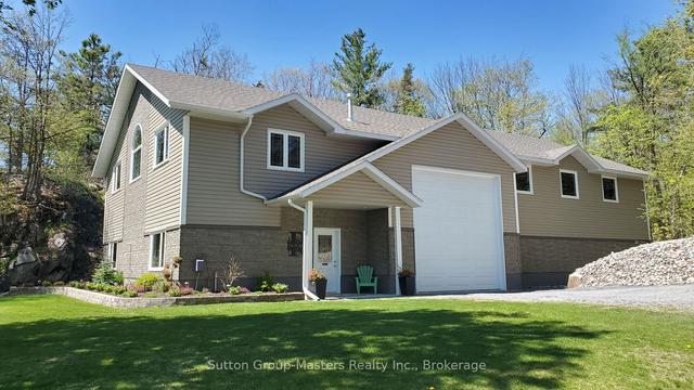 5058 Rock Cliff Lane, House detached with 3 bedrooms, 5 bathrooms and 24 parking in South Frontenac ON | Image 3