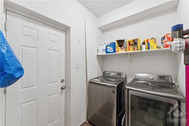 Laundry Room with Access to Garage | Image 14