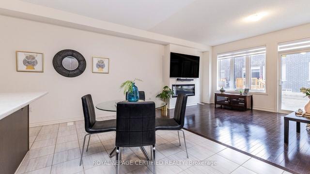 128 Adventura Rd, House attached with 4 bedrooms, 3 bathrooms and 3 parking in Brampton ON | Image 3