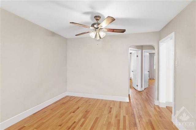 (Virtually Altered)  Main Floor 2 Bedroom Apt- Dining Room w/ ceiling fan above. | Image 9
