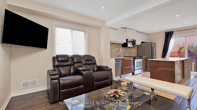 54 Millstone Dr, House attached with 3 bedrooms, 4 bathrooms and 4 parking in Brampton ON | Image 37