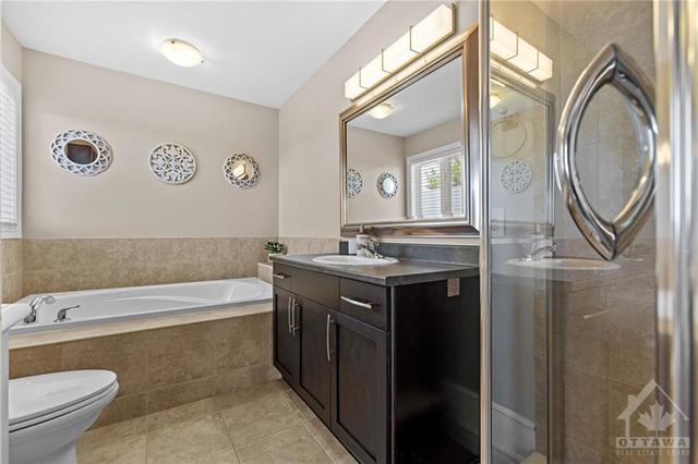 Ensuite with soaker tub & stand alone shower. | Image 18
