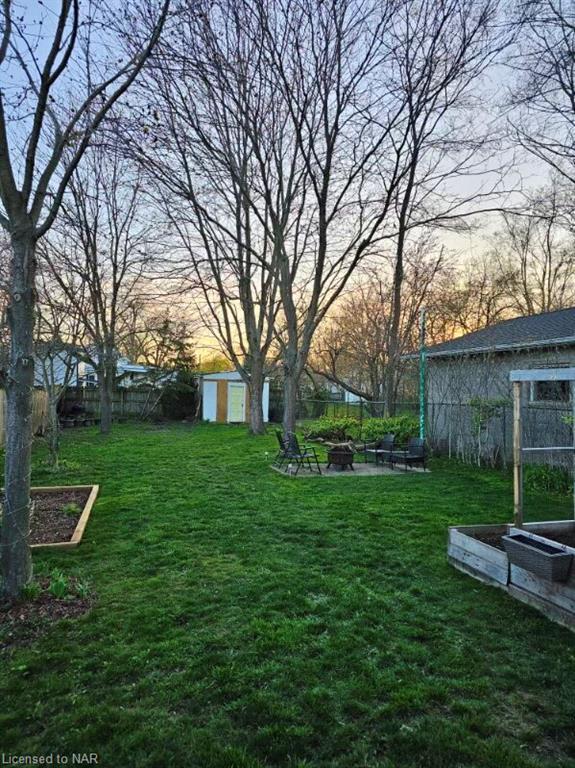 Main floor laundry and water heater. | Image 24