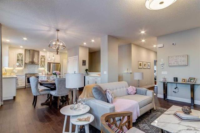 210 - 20 Silverado Crest Park Sw, Home with 3 bedrooms, 2 bathrooms and 2 parking in Calgary AB | Image 3