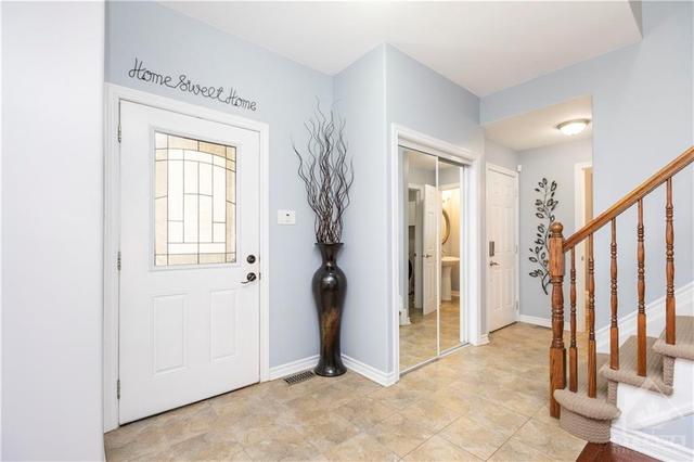 Spacious foyer with direct access to your powder room. | Image 2