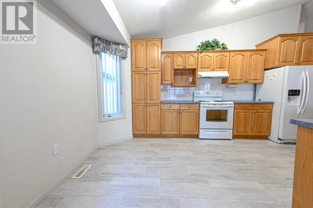 15, - 8910 122 Avenue, House semidetached with 4 bedrooms, 3 bathrooms and 3 parking in Grande Prairie AB | Image 15