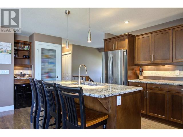 9823 Kinross Place, House detached with 5 bedrooms, 3 bathrooms and 4 parking in Coldstream BC | Image 11