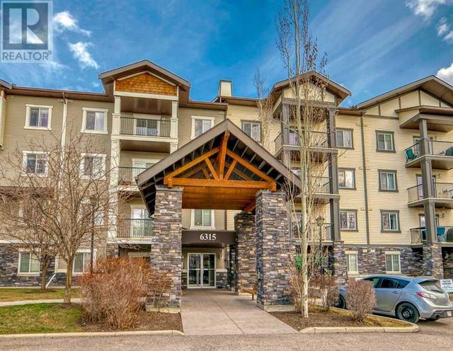 213, - 6315 Ranchview Drive Nw, Condo with 2 bedrooms, 2 bathrooms and 2 parking in Calgary AB | Image 1