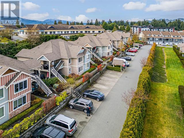 101 - 6157 Washington Way, House attached with 2 bedrooms, 2 bathrooms and 2 parking in Nanaimo BC | Image 47