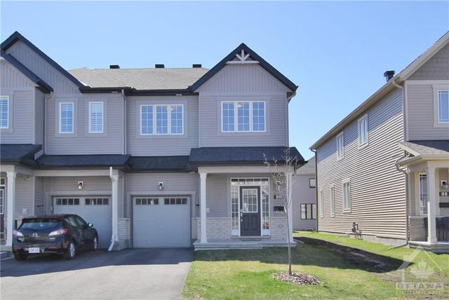 98 Mesa Drive, Townhouse with 4 bedrooms, 3 bathrooms and 3 parking in Ottawa ON | Image 1