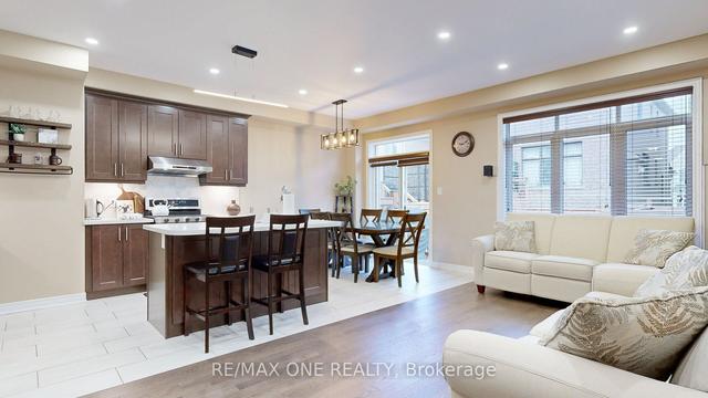 213 Wisteria Way, House attached with 3 bedrooms, 4 bathrooms and 2 parking in Oakville ON | Image 6