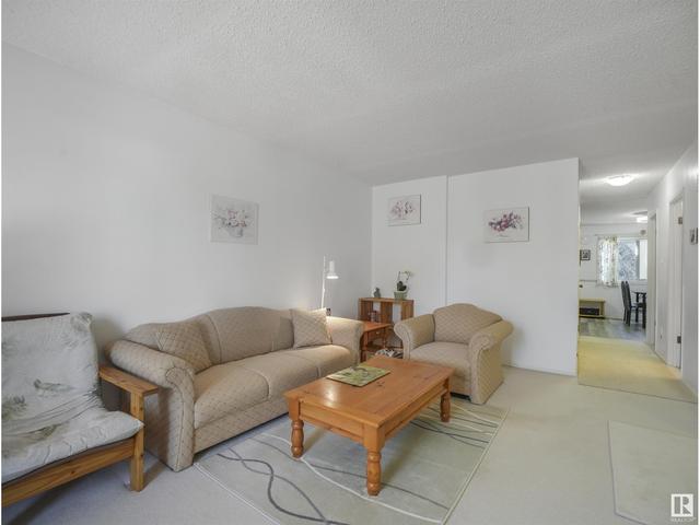 1052 106 St Nw, House attached with 3 bedrooms, 1 bathrooms and 2 parking in Edmonton AB | Image 4