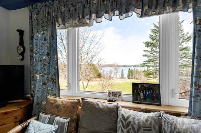 Family room offers more breath-taking lake views | Image 15