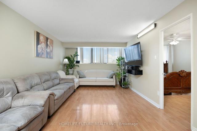 411 - 10 Tapscott Rd, Condo with 2 bedrooms, 2 bathrooms and 1 parking in Toronto ON | Image 3