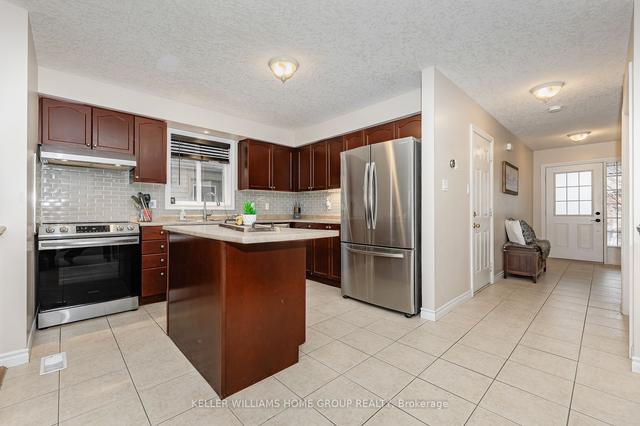 42 Atto Dr, House detached with 3 bedrooms, 3 bathrooms and 3 parking in Guelph ON | Image 39