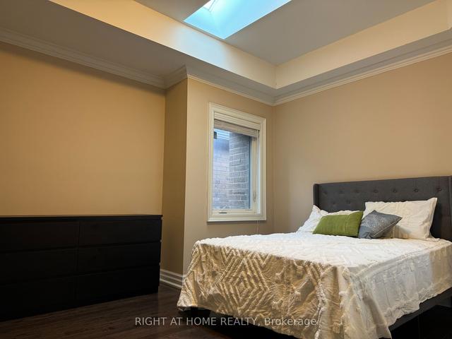 58b Thirty Second St, House detached with 3 bedrooms, 4 bathrooms and 3 parking in Toronto ON | Image 11