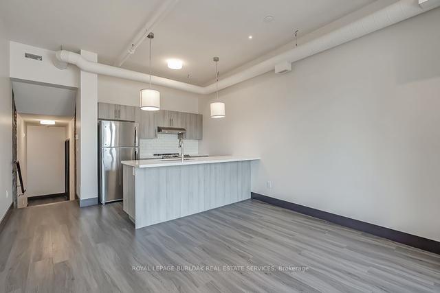 308 - 121 King St E, Condo with 2 bedrooms, 1 bathrooms and 1 parking in Hamilton ON | Image 19