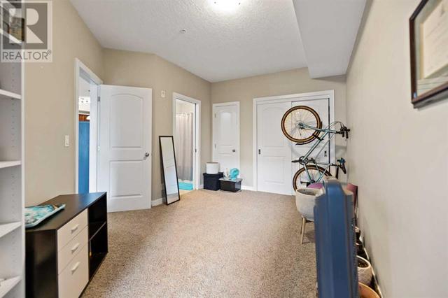 112, - 15304 Bannister Road Se, Condo with 2 bedrooms, 2 bathrooms and 2 parking in Calgary AB | Image 18