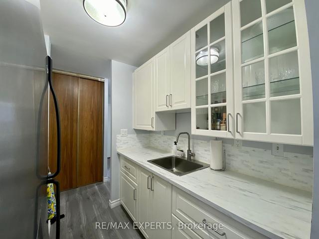 406 - 17 Eldon Hall Pl, Condo with 2 bedrooms, 1 bathrooms and 1 parking in Kingston ON | Image 10