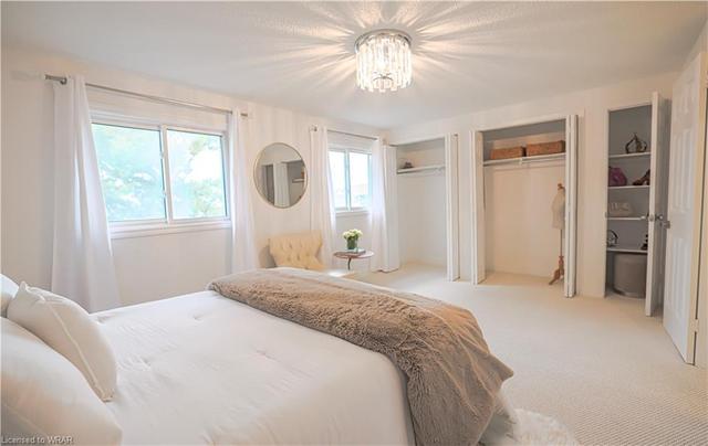 Elegant Primary Bedroom with New Ceiling Light | Image 16