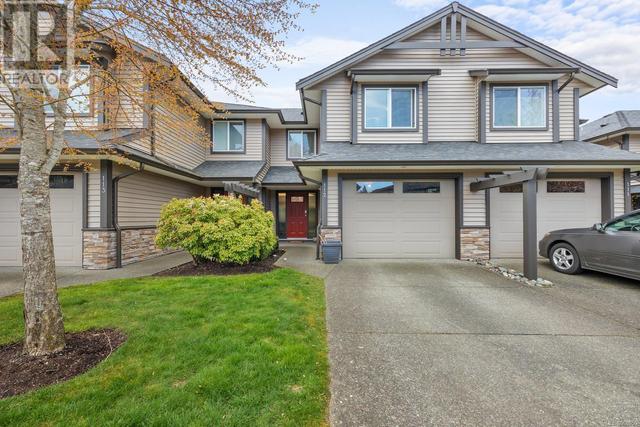 112 - 4699 Muir Rd, House attached with 3 bedrooms, 4 bathrooms and 20 parking in Courtenay BC | Image 1