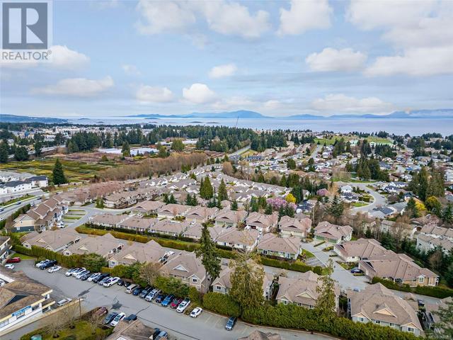 101 - 6157 Washington Way, House attached with 2 bedrooms, 2 bathrooms and 2 parking in Nanaimo BC | Image 51