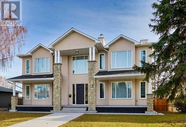 54 Malibou Road Sw, House detached with 5 bedrooms, 3 bathrooms and 3 parking in Calgary AB | Image 2