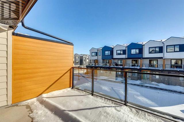 205, - 8535 19 Avenue Se, House attached with 2 bedrooms, 1 bathrooms and 2 parking in Calgary AB | Image 2