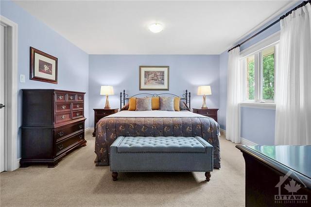 Spacious Primary BR easily accommodates a king bed. | Image 17